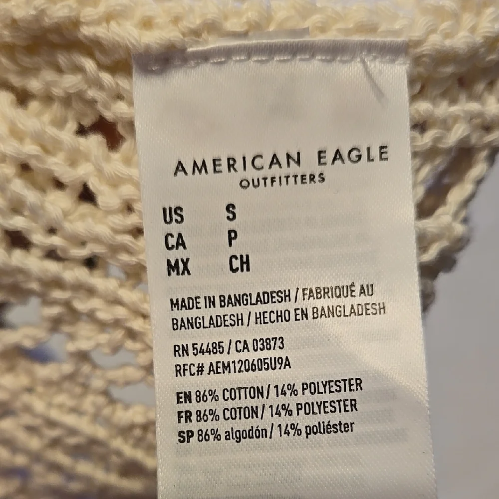 B78. New American Eagle Outfitters Cream Polo Lace Up Knit Sweater Size Small - Picture 5 of 6